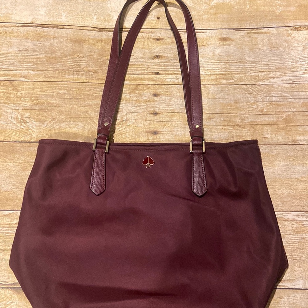 Kate Spade wine colored purse gently used